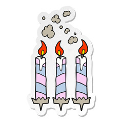 sticker of a cartoon birthday cake candles