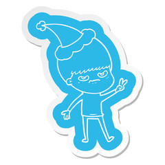 annoyed cartoon  sticker of a boy wearing santa hat