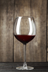 Glass of Wine on The Wooden Table