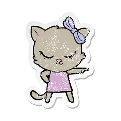 distressed sticker of a cute cartoon cat with bow
