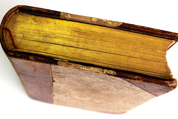 old book with gold-plated pages top view