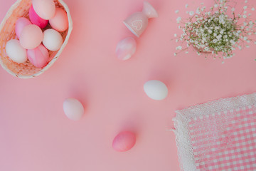 Easter eggs pastel colors on pink background