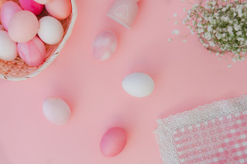 Easter eggs pastel colors on pink background