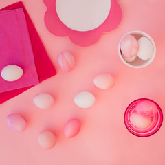 Easter eggs pastel colors on pink background