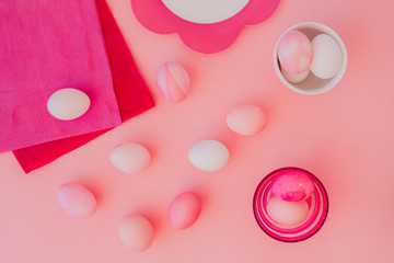 Easter eggs pastel colors on pink background
