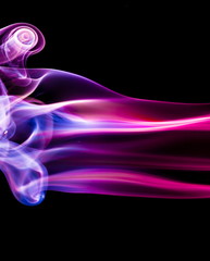 Fototapeta premium Colored smoke on black background