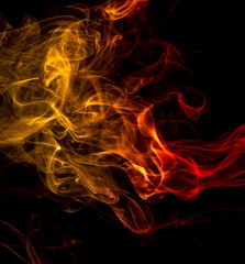 Fototapeta premium Colored smoke on black background