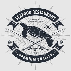 Seafood restaurant logo  with Sea Turtle and fishing rods. Vintage badge design. Vector illustration. 