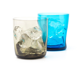 A blrown and blue modern glass fill with ice