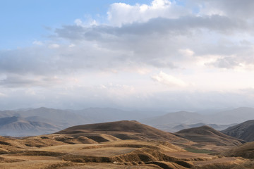 brown hills high in the mountains, nothing grows