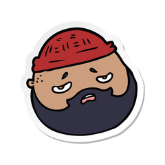sticker of a cartoon male face with beard
