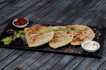Chebureks. Traditional meat dish of the peoples of Central and Central Asia, rice, meat and onions, suitable for the Nauryz or Navruz holidays, as well as during the Holy month of Ramadan and the holi