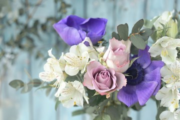Flower arrangement of fresh flowers аlstroemeria, roses and anemone.