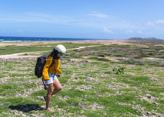 Girl Hiking on Coastline