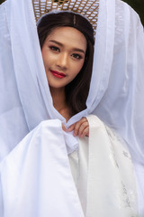 Beautiful Chinese woman white dress traditional, Beautiful and belligerent face; asian you woman in...