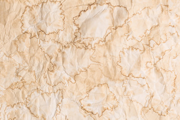 Crumpled old stained textured abstract paper background