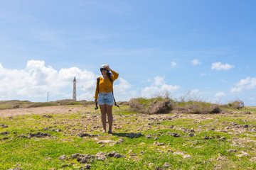 Girl in lighthouse with blue sky 