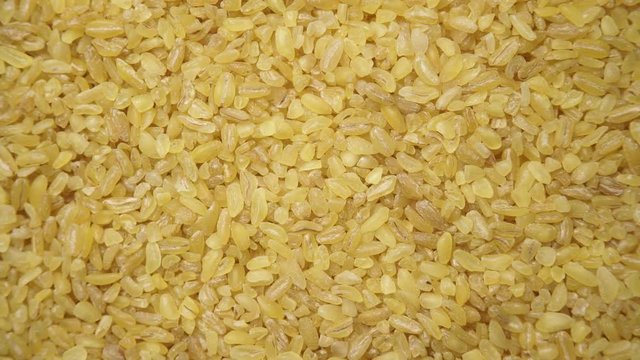 Bulgur wheat cereal food as background. Top view. Healthy diet