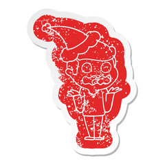 cartoon distressed sticker of a man totally stressed out wearing santa hat