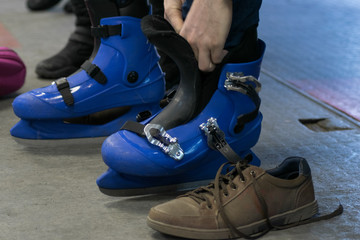 blue skates. preparation for skating on ice