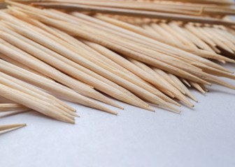 A toothpick in a dozen on a white background