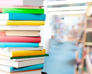 Old Books stacked on background.