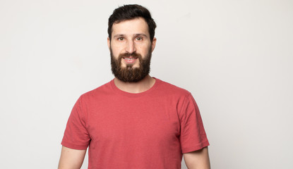 Portrait of cheerful smiling bearded man 