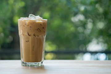 Ice coffee in a tall glass