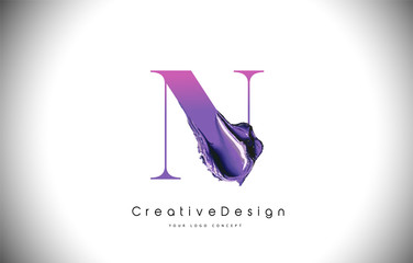 N Letter Design Brush Paint Stroke. Purple n Letter Logo Icon with Violet Paintbrush