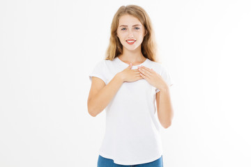 Girl touching her heart. Healthy life style living. Love romance and body language. Smiling happy woman face and template white t shirt with copy space isolated on white background. Summer time