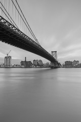 Williamsburg Bridge view from East River with long exposure