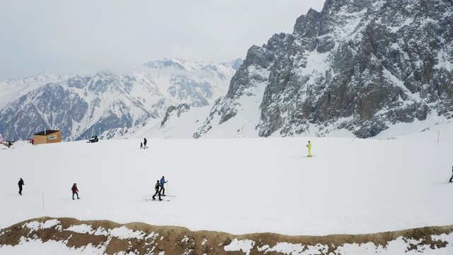 Two man skitouring at the Shymbulak mountain resort, Almaty, Kazakhstan. Aerial.