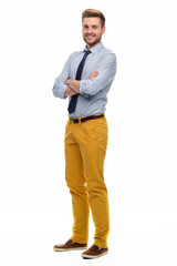 Full length portrait of young man standing on white background