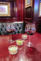 Wine glasses in a restaurant setting.