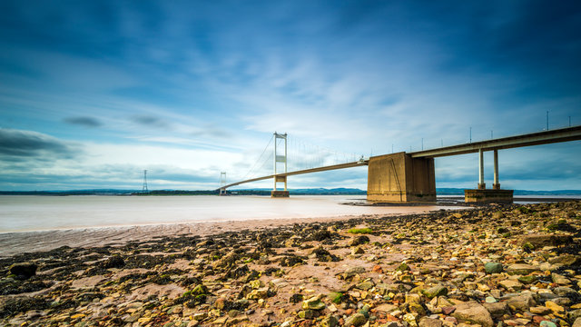 Gateway to Wales, built in 1966 the Severn Bridge and beach.