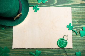 St. Patrick's Day. Leprechaun hat with empty blank and wax seal with shamrock