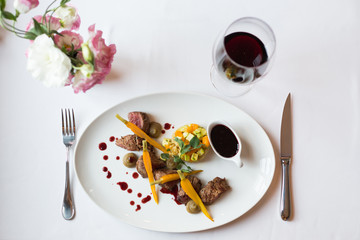 salad with warm veal sauce and vegetables