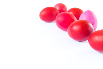 Red and pink easter eggs isolated on white background