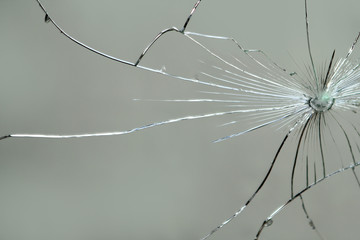 Large cracks on the texture of the broken mirror, glass