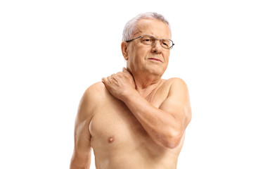Fototapeta na wymiar Elderly man holding his painful neck