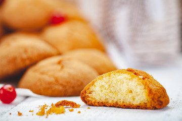 Homemade tangerine cookies on wooden rustic table. Close up