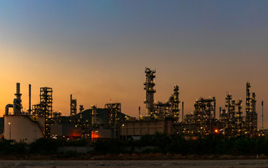 oil refinery at twilight.