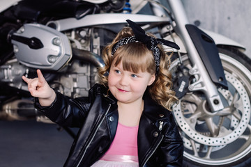 Little rock blond girl with curls