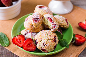 Homemade cookies with strawberries and icing sugar