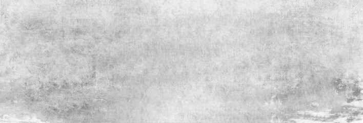 Obraz premium Eine Textur einer alten, hellgrauen Betonwand als Hintergrund, auf die Tageslicht fällt