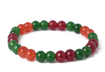 Stone bracelet red with white background. 