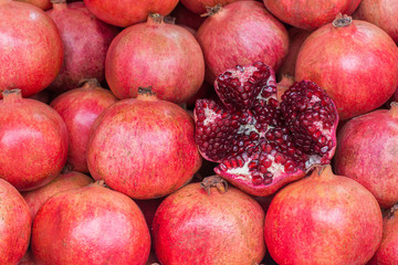 Fototapeta na wymiar Pomegranate fruits, on the market counter