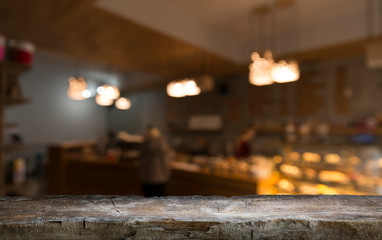 blurred background of bar and dark brown desk space of retro wood