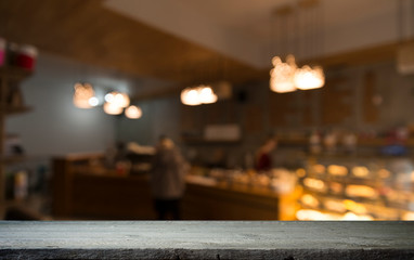 blurred background of bar and dark brown desk space of retro wood