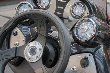 Steering wheel and dashboard of speed luxury boat